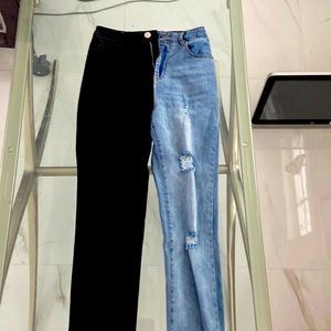 Half black have blue jeans distressed